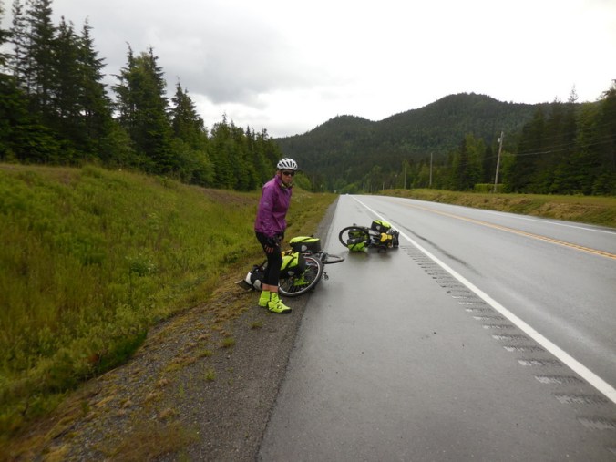 Nancy getting up, she fell to down the bank, I layed my bike down to help her