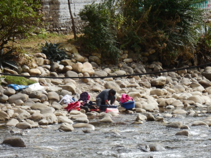 Monday is clothes washing day at the riverq