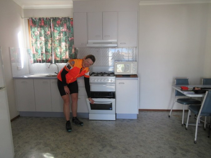 Nancy being domestic in our 1950s cabin